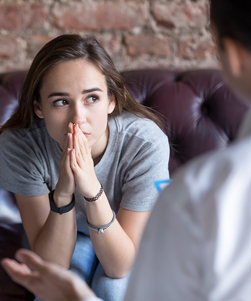 girl talking to her therapist